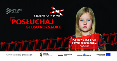Billbord kampanii, tekst Zatrzymaj się przed przejazdem tatusiu, postać dziewczynki.